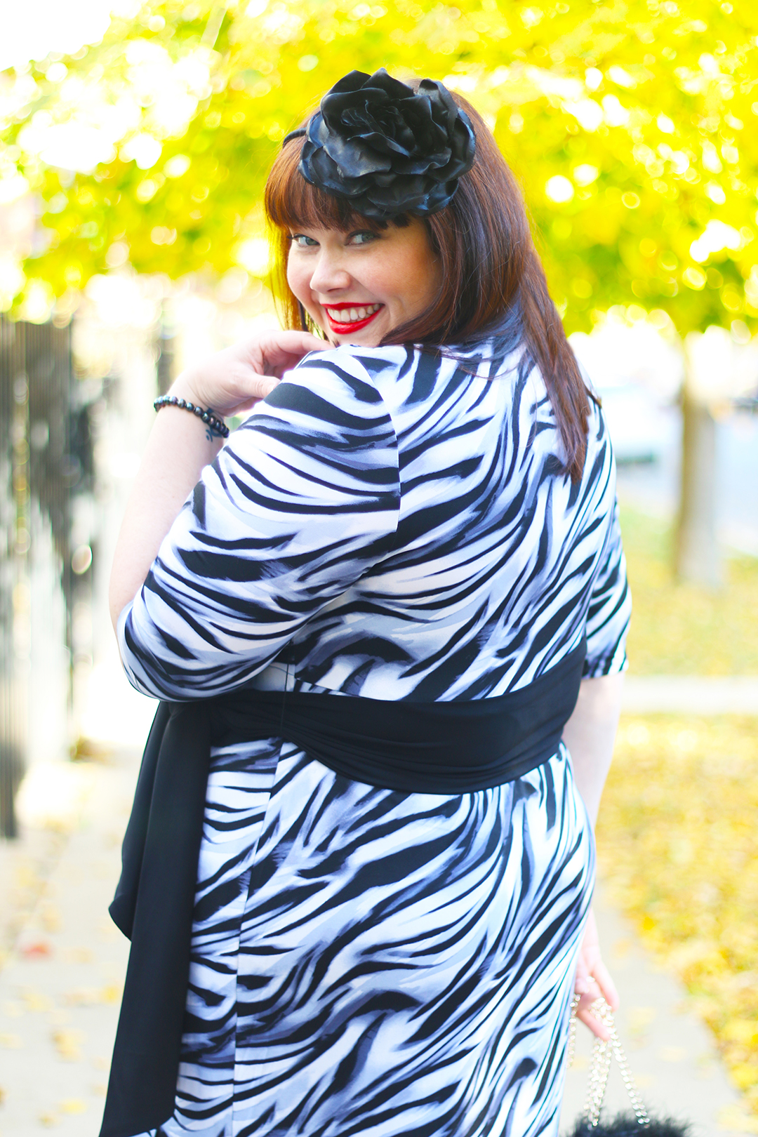 Chicago Plus Size Blogger Amber from Style Plus Curves in a Kiyonna Wrap Dress, Dahlia dress, plus size dress, Black Friday Sale, Tiger Print Dress
