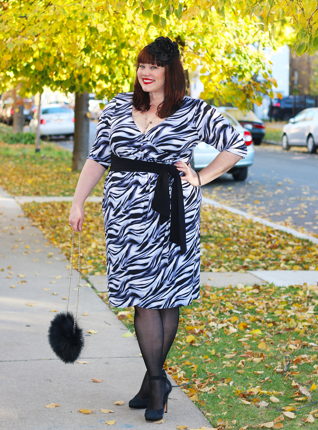 Chicago Plus Size Blogger Amber from Style Plus Curves in a Kiyonna Wrap Dress, Dahlia dress, plus size dress, Black Friday Sale, Tiger Print Dress