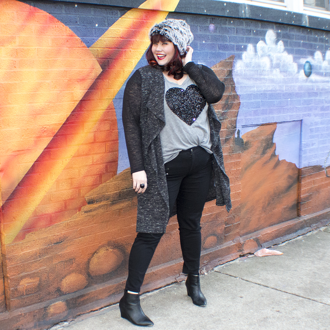 Plus Size Blogger Amber in a Torrid Heart Top and Torrid Black Jeggings
