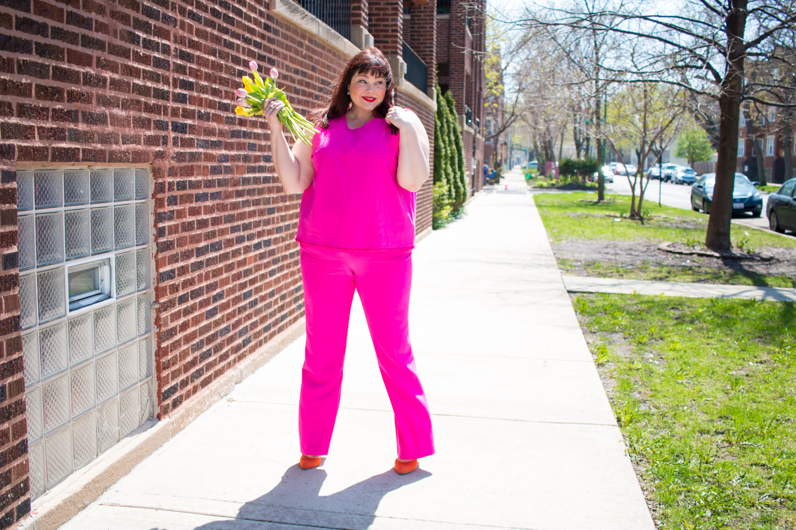 Plus Size Blogger wearing a pink suit from Victoria Beckham x Target collection