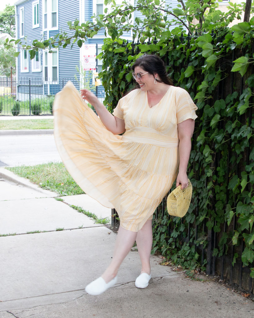 yellow fit-and-flare plus size dress from lane bryant modeled by Amber, a plus size blogger in Chicago