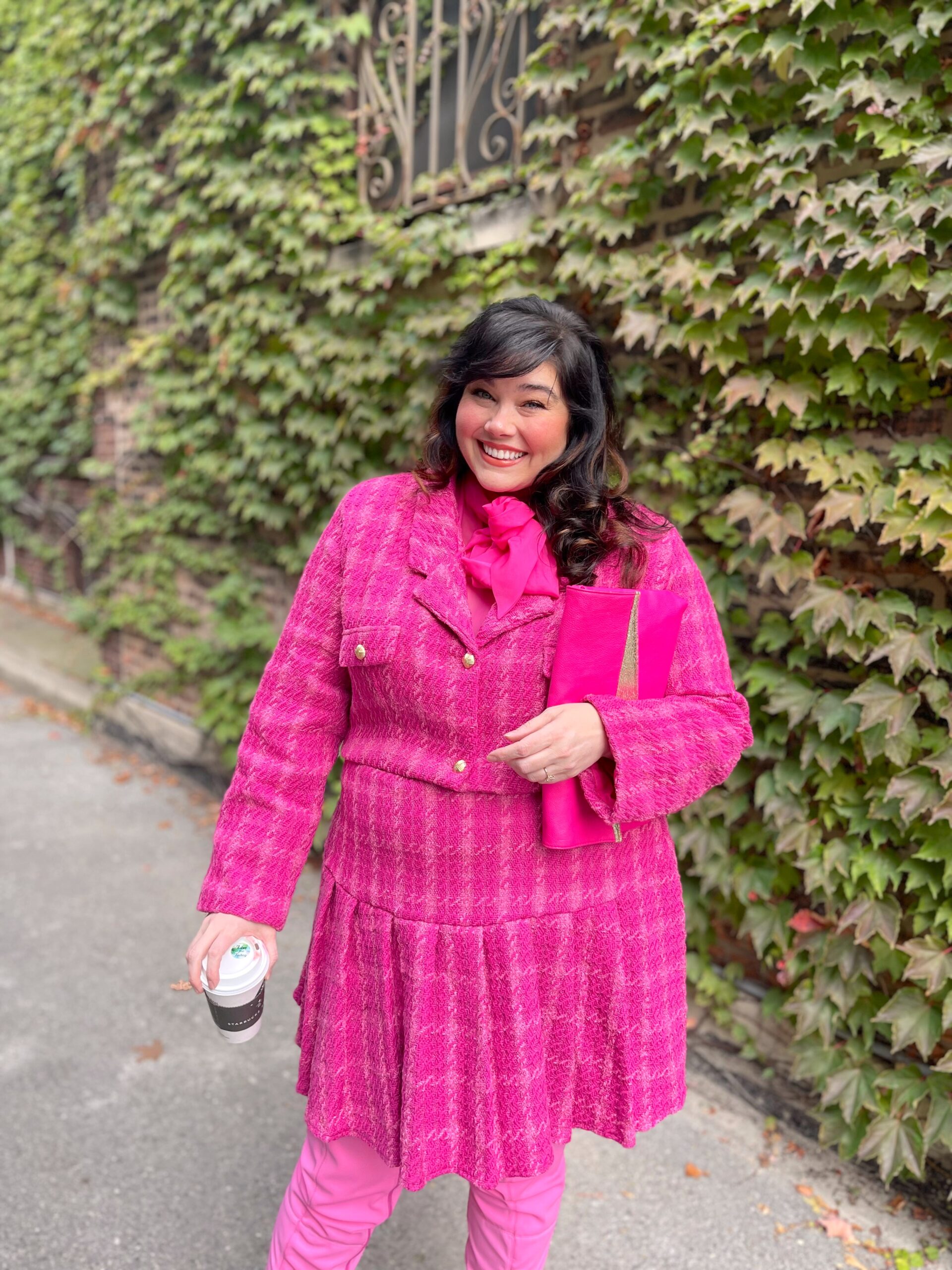 Plus size creator in Chicago wearing an all pink outfit for fall